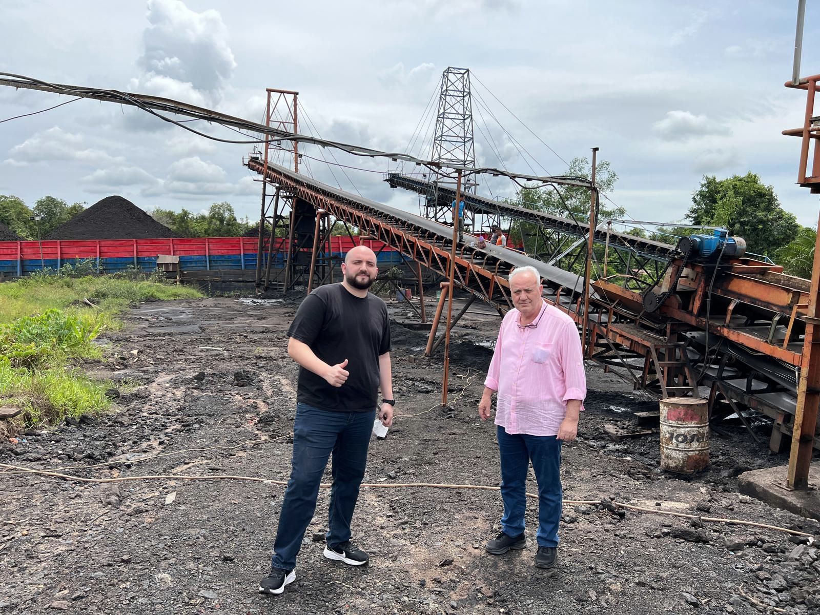 Coal loading conveyor and stockpiles at origin site