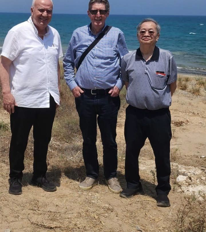 TEM executive with project evaluators on site