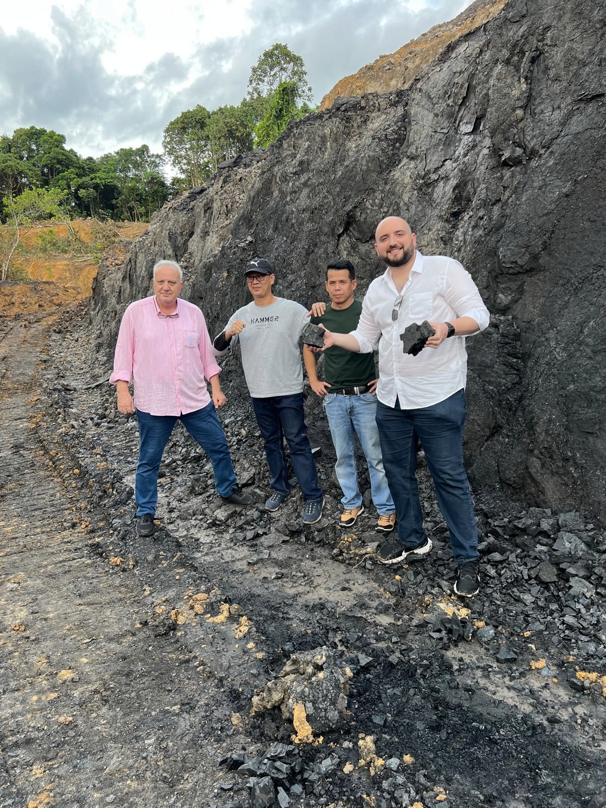 TEM Global executives inspecting a coal seam at origin with mine partners